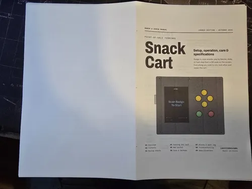 Printed manual pages laid out flat with the cover facing up