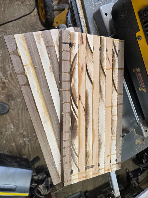 Spare strips of walnut and maple staged for a glue-up
